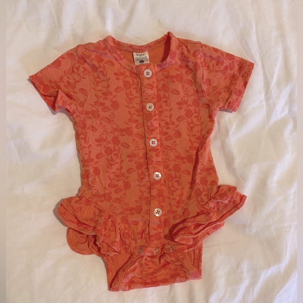 Kate Quinn Coral Ruffle Leg Romper